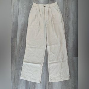 Reformation trousers in a creamy white 2p